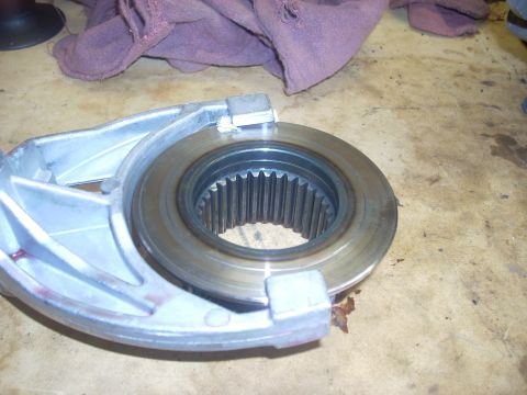 1992 Ford Bronco - Close-up of a vehicle transfer case component, showing internal gears and housing.