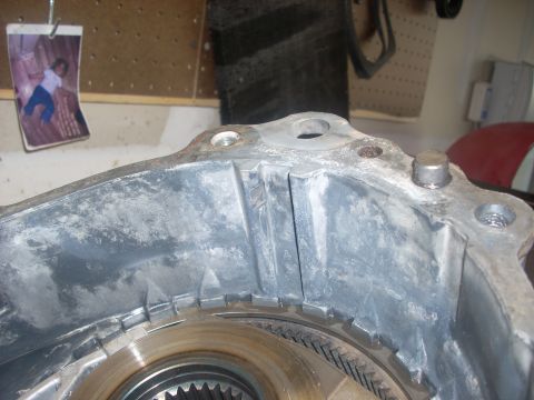 1992 Ford Bronco - Transfer case housing interior detail with a small photo in the background.