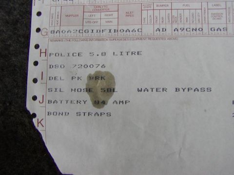 1991 Ford LTD Crown Victoria - Ford build sheet remarks section listing VIN, DSO 720076, Police 5.8 litre engine, battery and bond strap notes.