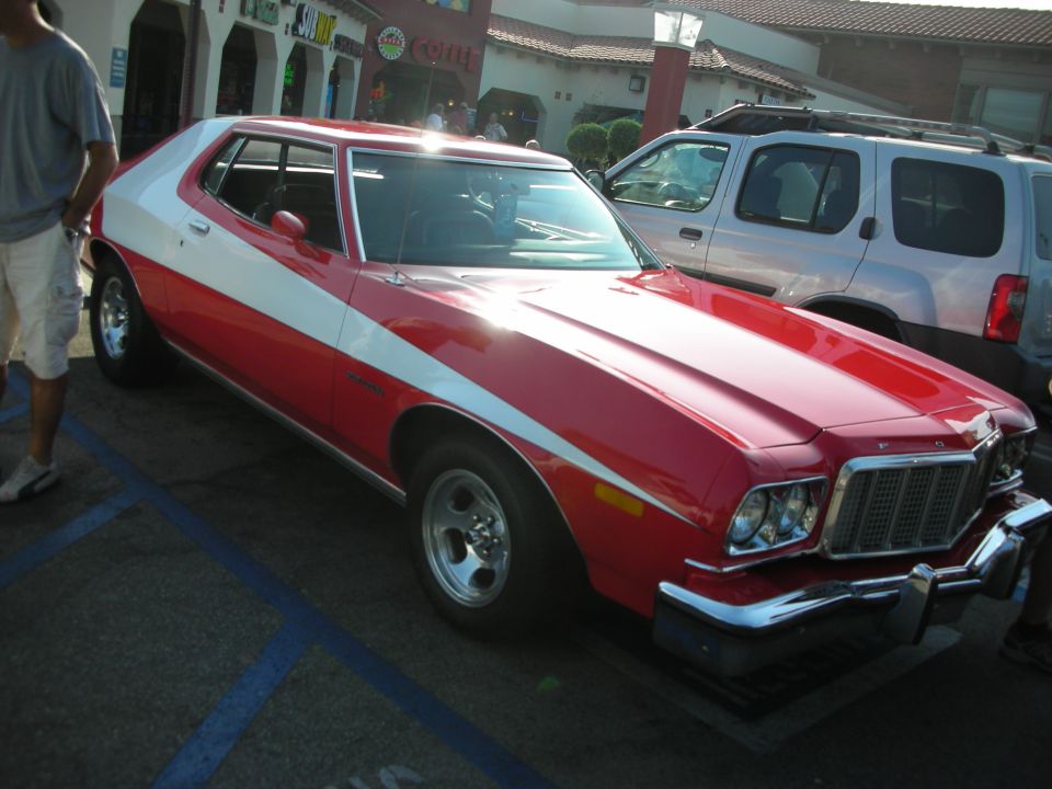 Red and white 1977 Ford Gran Torino coupe, 3q-front view