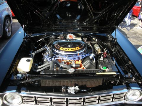 1998 Ford Crown Victoria - Classic car engine bay a Hemi Head air cleaner and prominent V8 engine components.