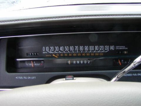 1991 Ford LTD Crown Victoria - Dashboard view showing the speedometer, fuel gauge, and gear selector. The registry claims this is a 1991 Ford Crown Victoria LTD, but the…