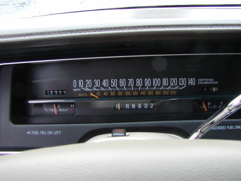 Interior dashboard with speedometer, fuel gauge, and RND2 gear selector