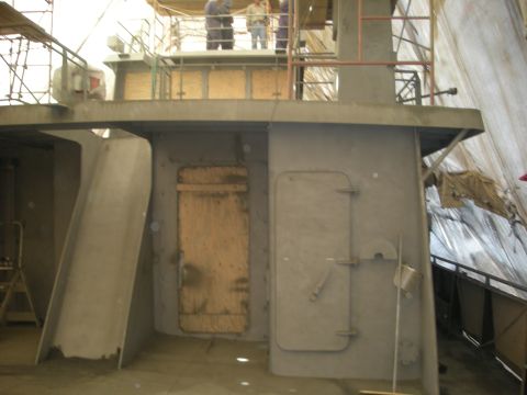 1991 Ford Bronco - Interior of a ship under construction, showing unfinished doors and structural elements.