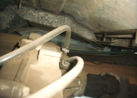 1987 Ford Bronco - Tubing coming out of transfer case. This tubing is ran together with the transmission(seen in other the photo)