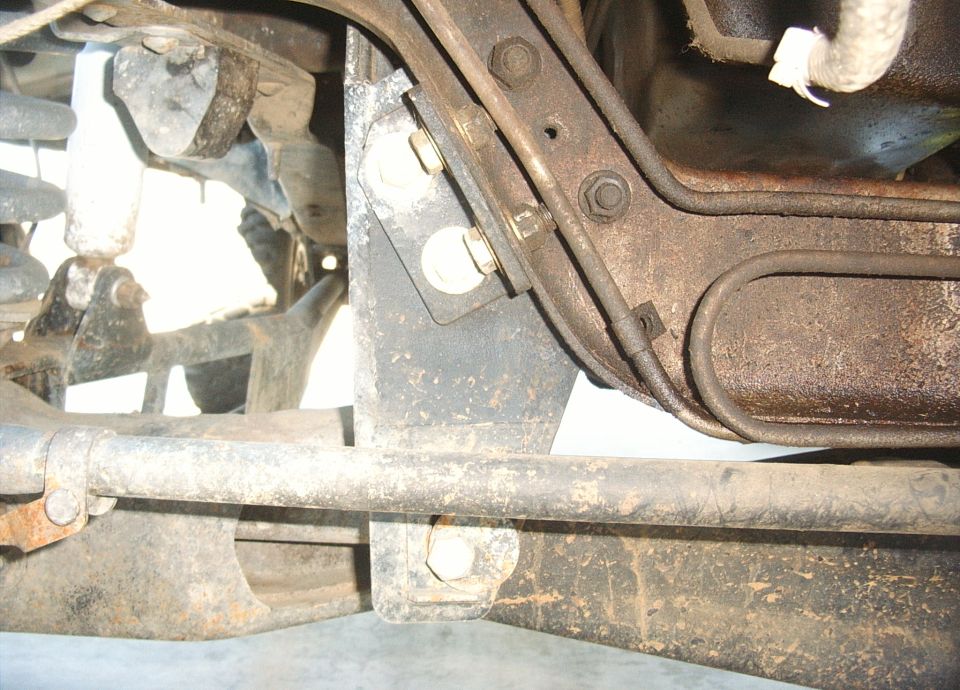 Undercarriage suspension components with SuperMotors logo