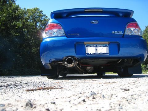 2007 Subaru Impreza - Blue 2007 Subaru Impreza WRX rear view, showing the exhaust and spoiler.