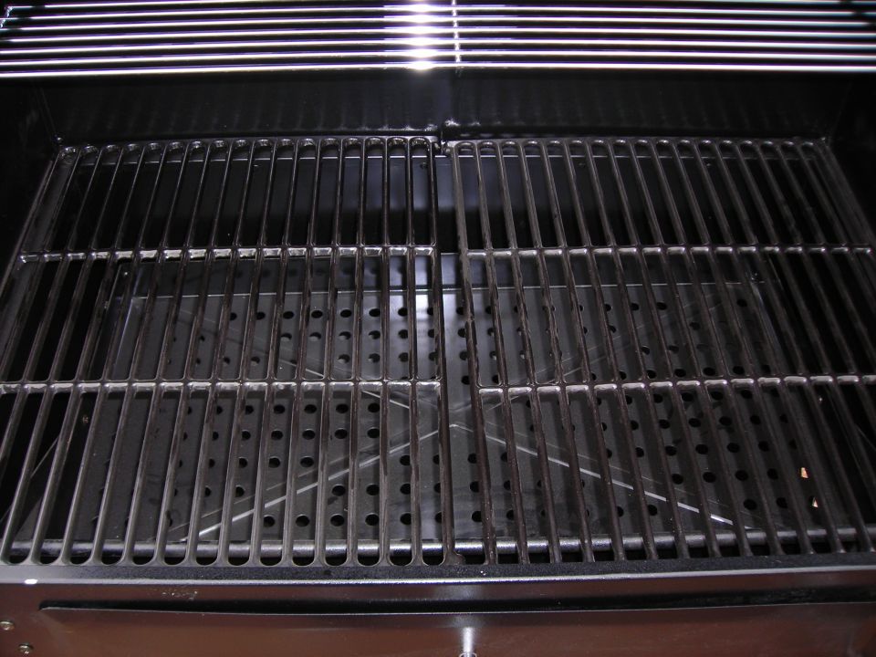 Grill grates and interior with perforated metal below