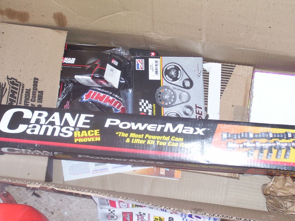 Box of Crane Cams PowerMax cam and lifter kit, plus other engine parts