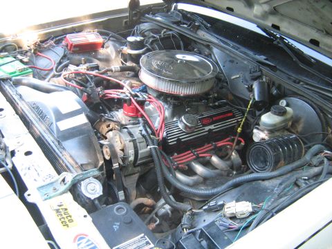 1988 Mercury Grand Marquis - Engine bay detail with V8 engine, aftermarket headers, and air cleaner visible.