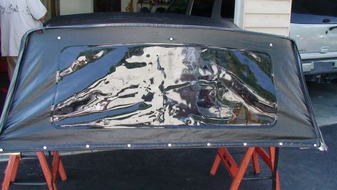 1979 Ford Bronco - Soft top assembly with a clear plastic window, likely for a convertible or SUV.