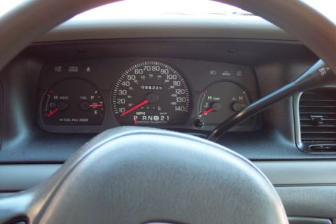 2001 Ford Crown Victoria - The dashboard of a 2001 Ford Crown Victoria displays the odometer reading of 98,239 miles.