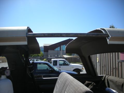 1991 Ford Bronco - Interior of a 1991 Ford Bronco, with other vehicles visible through the windows.