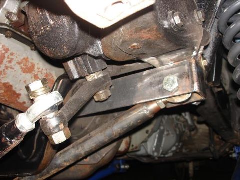 1996 Ford F-150 - Close-up view of the steering and suspension system of a vehicle, with website text visible.