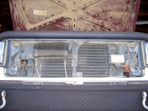 1991 Ford Bronco - Front view of the transmission cooler and radiator assembly on a 1991 Ford Bronco.