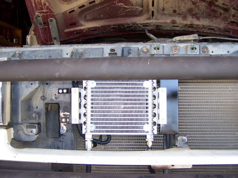 1991 Ford Bronco - The transmission cooler is visible behind the bumper and in front of the radiator.