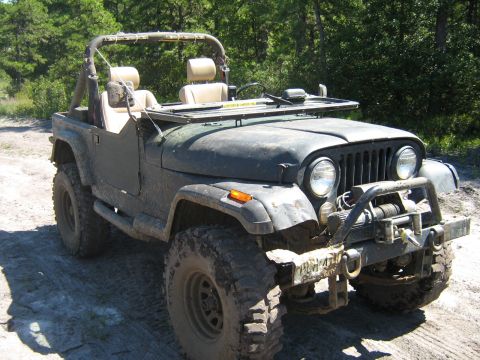 1990 Ford Bronco - This Jeep CJ-7 is equipped for off-road adventures with a winch and tires.