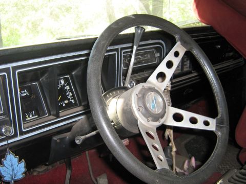 1990 Ford Bronco - Interior view of a 1978 Ford Bronco, showing the steering wheel and dashboard.