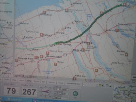 2001 Ford Crown Victoria - GPS navigation screen shows a map with a route, speed, and distance data displayed.