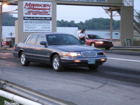 2001 Ford Crown Victoria - Photograph of a Mercury Grand Marquis at St. Thomas dragway, not a technical document.