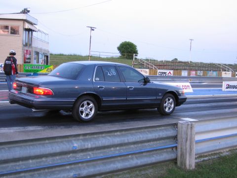 2001 Ford Crown Victoria - Photograph of a Mercury Grand Marquis sedan at a dragway, not a technical document.