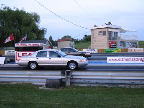 2001 Ford Crown Victoria - Photograph of a Ford Crown Victoria at St. Thomas dragway, not a technical document.