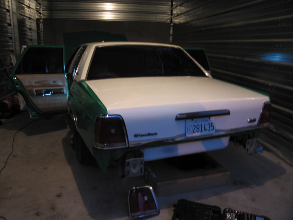 1991 Ford Crown Victoria LTD rear view with doors open, license plate C281435