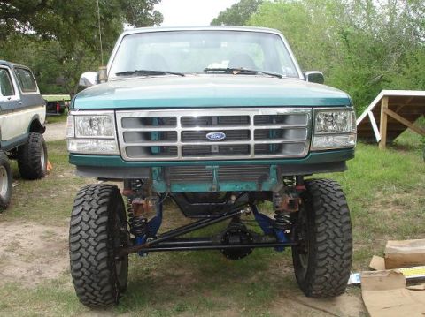 1996 Ford F-150 - This lifted 1996 Ford F-150 shows off its front grille and suspension modifications.
