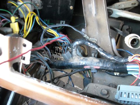 1978 Ford Bronco - A complex network of wires and electrical components is visible within the vehicle's interior.