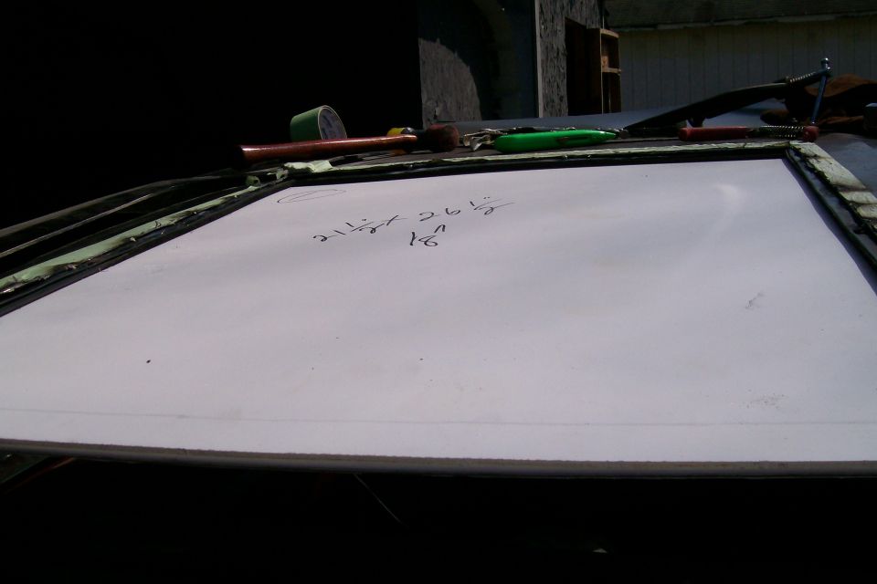 Lexan in with the window window guides in the roof.