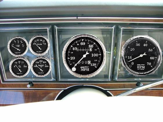 Dashboard with speedometer, tachometer, oil pressure, voltage, and water temperature gauges