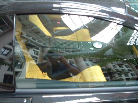 1999 Mercury Grand Marquis - View of a car's interior yellow quilted seats and a dark dashboard.