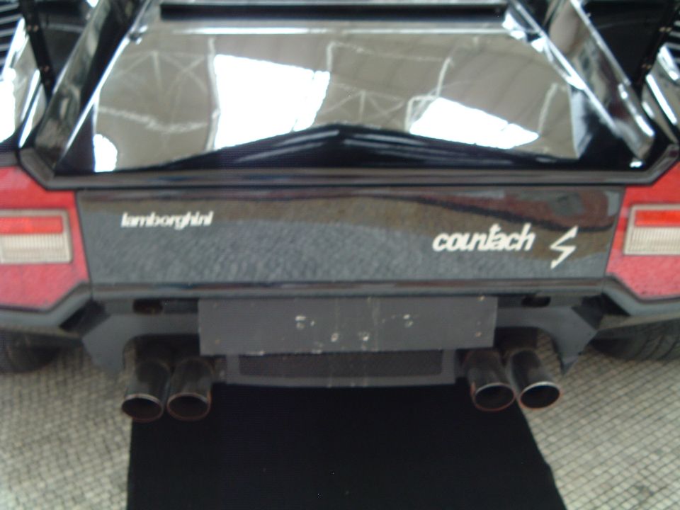Lamborghini Countach S rear bumper with quad exhaust pipes and badging