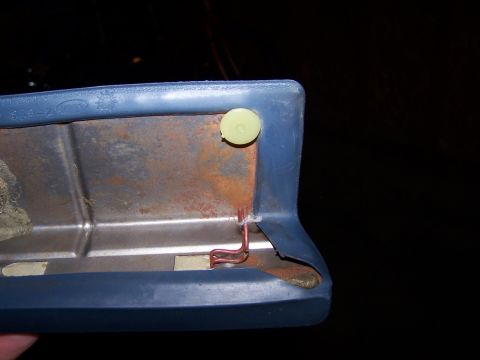 1986 Ford Bronco - Interior trim piece showing rust and wiring detail.