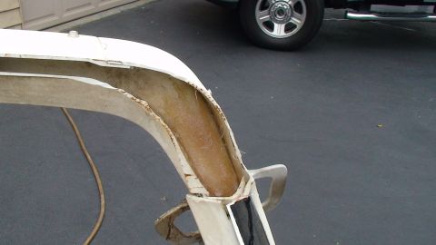 1979 Ford Bronco - Close-up of a white fiberglass fender flare, showing its internal construction.