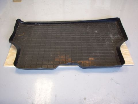 1996 Ford Bronco - I used 3/8 inch plywood for the base. I used my cargo mat as a template to cut out the wheel wells.