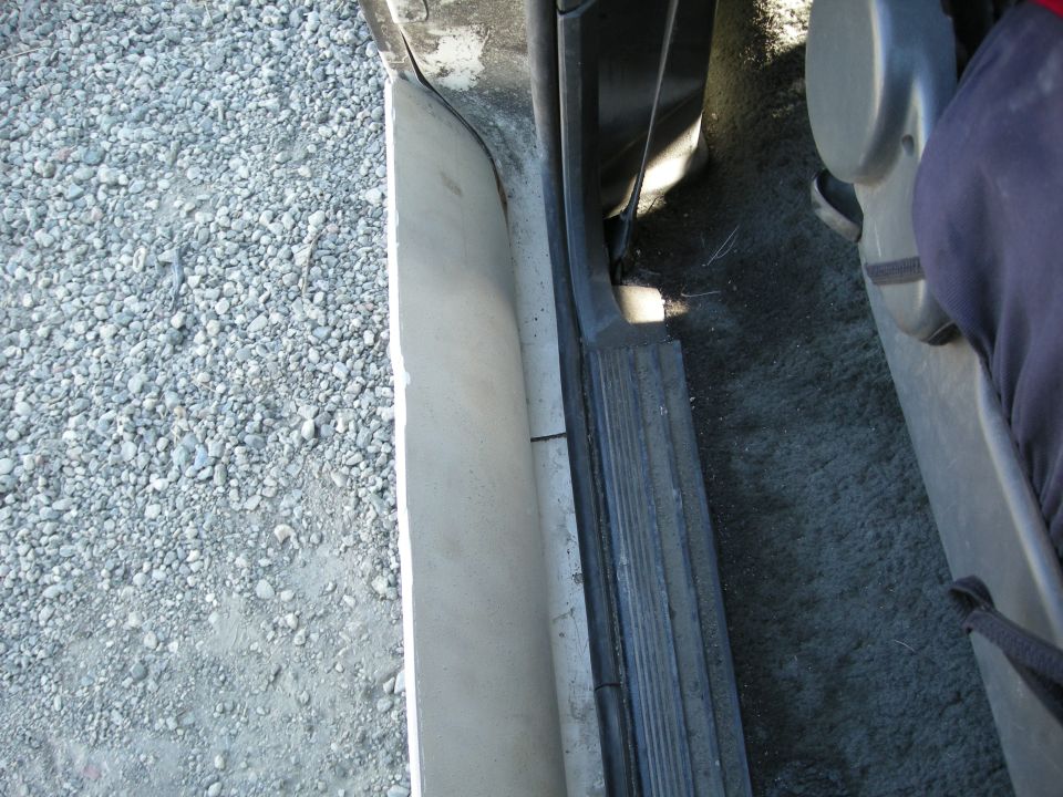 Interior door sill and carpet of a vehicle