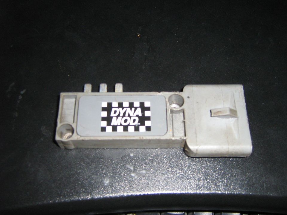 Ignition control module with 'DYNA MOD' checkered label