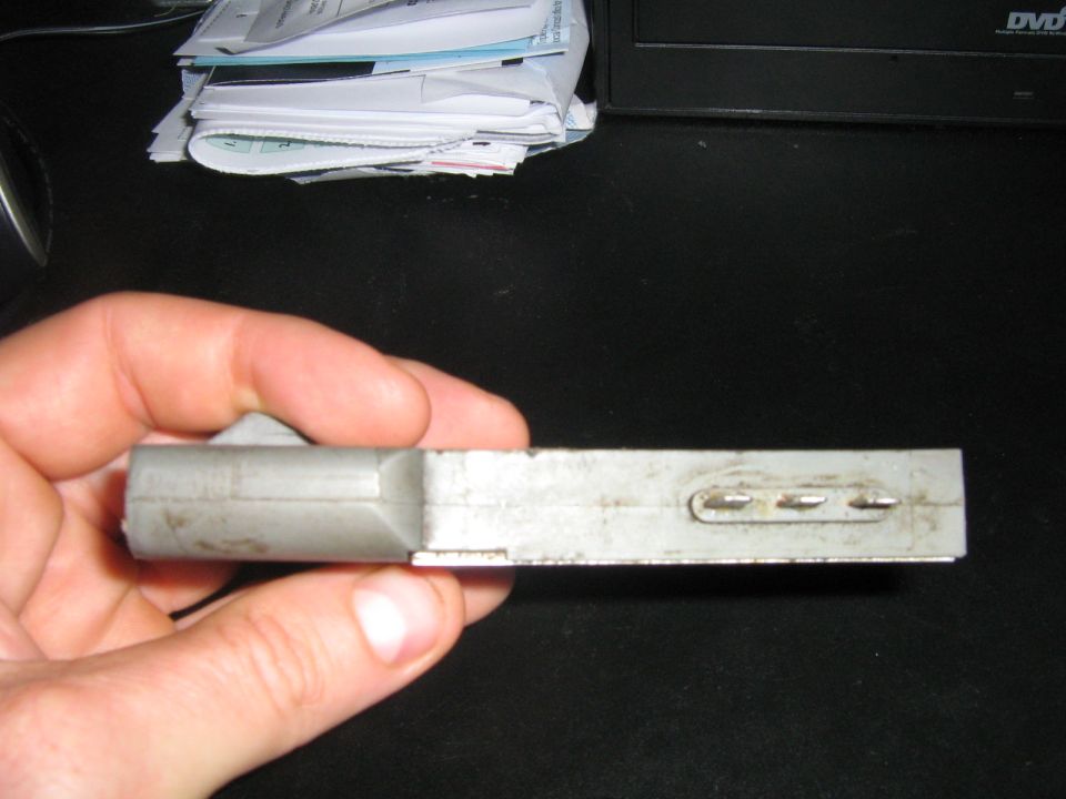 Automotive electrical connector held in hand