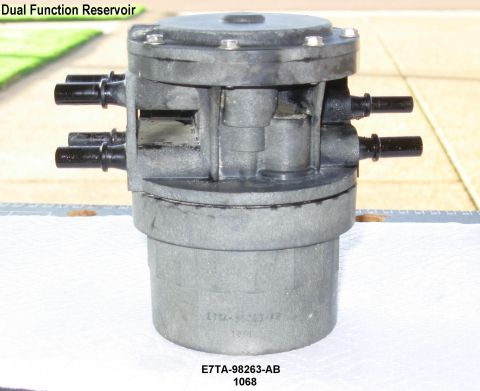 1983 Ford Bronco - Dual-Function Reservoir Assembled (replaced by F1UZ-9B263-B ) After thoroughly cleaning the outside of the reservoir assembly and loosening…