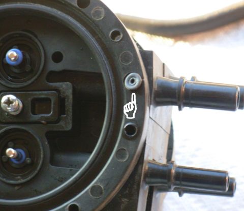 1983 Ford Bronco - Dual Function Reservoir O-ring Without distorting it, remove the tiny O-ring from the edge of the body. Re-install the phillips screw by ha…