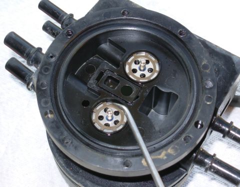 1983 Ford Bronco - Dual Function Reservoir Rings Using a clean, sharp pick, carefully pry each tab of the lock rings up one-at-a-time working slowly around ea…