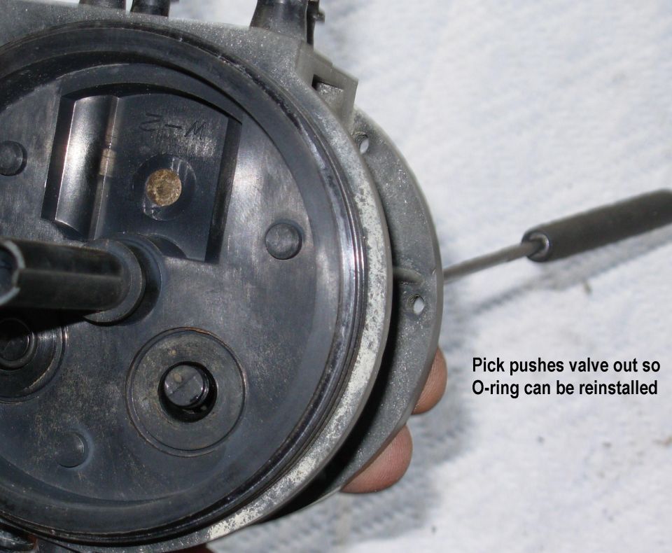 Dual Function Reservoir Check Valve 

WIth the supply switching valve removed, a bent probe can be used to push the check valve out far enough to reinstall the O-ring.

If the return check valve falls or leaks, it cannot be accessed.

To permanently eliminate the reservoir, use [url=https://www.amazon.com/dp/B0033YHPHG]these Dorman fuel tubes[/url].