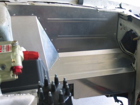 1992 Ford Mustang - Custom aluminum panels are installed in the engine bay, obscuring most of the original vehicle components.