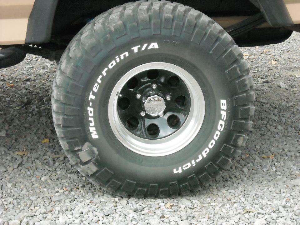 Close-up of a BFGoodrich Mud-Terrain T/A tire on a black wheel