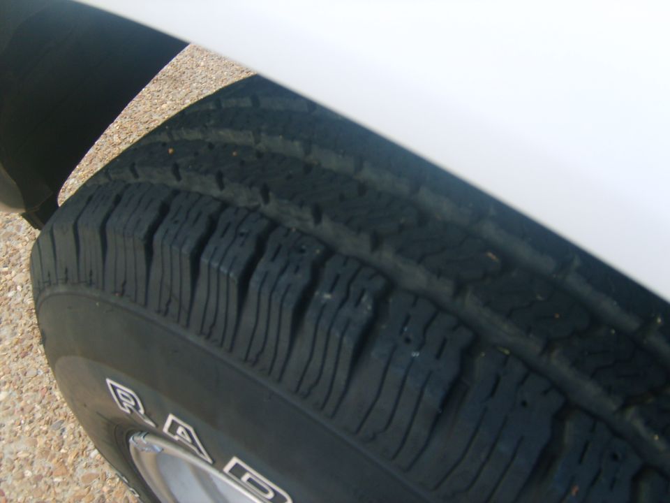 Close-up of a tire on a 1994 Ford Bronco with white lettering.