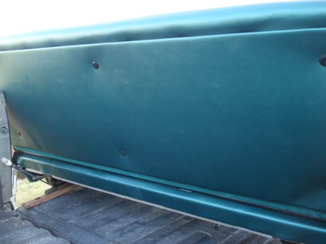 Teal vinyl seat back in a vintage pickup truck.