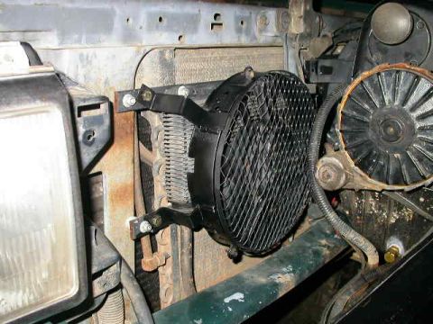 1990 Ford Bronco - Small fan over power steering cooler.