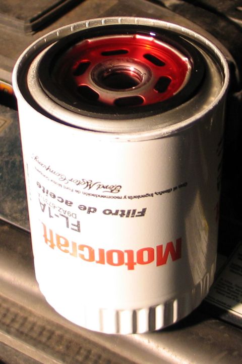 1994 Ford Bronco - Motorcraft FL-1A oil filter shown close-up. Part number D9AZ-6714-A is visible.