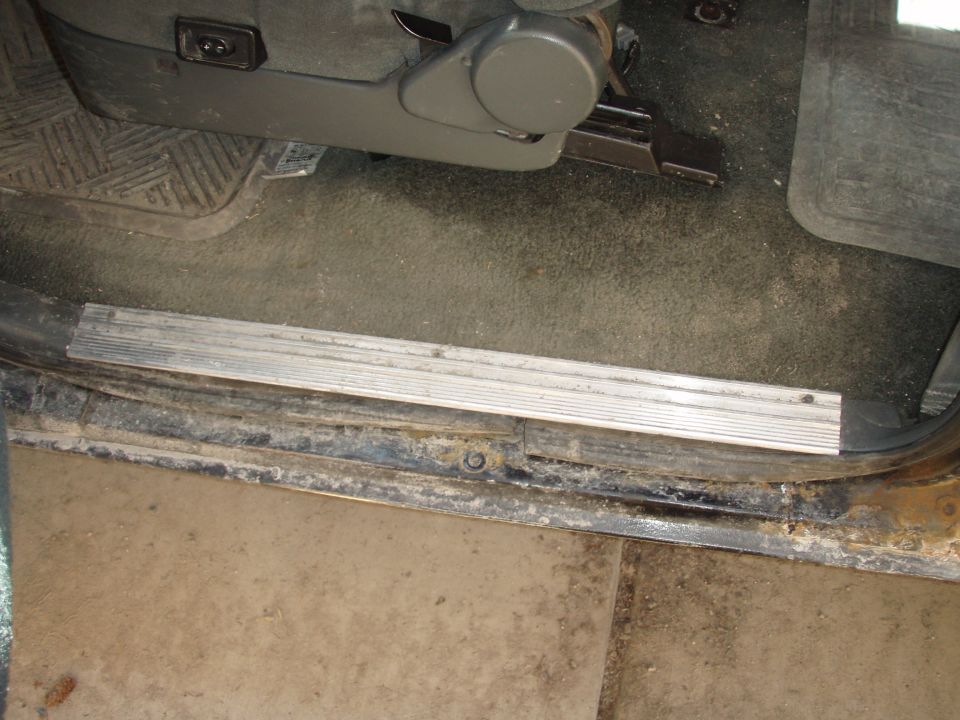 Some aluminum step boards i pulled off a ford F-150 at the Junk yard.

the stock black plastic ones have 4 screw holes, and these aluminum ones have 3. otherwise they fit perfectly!